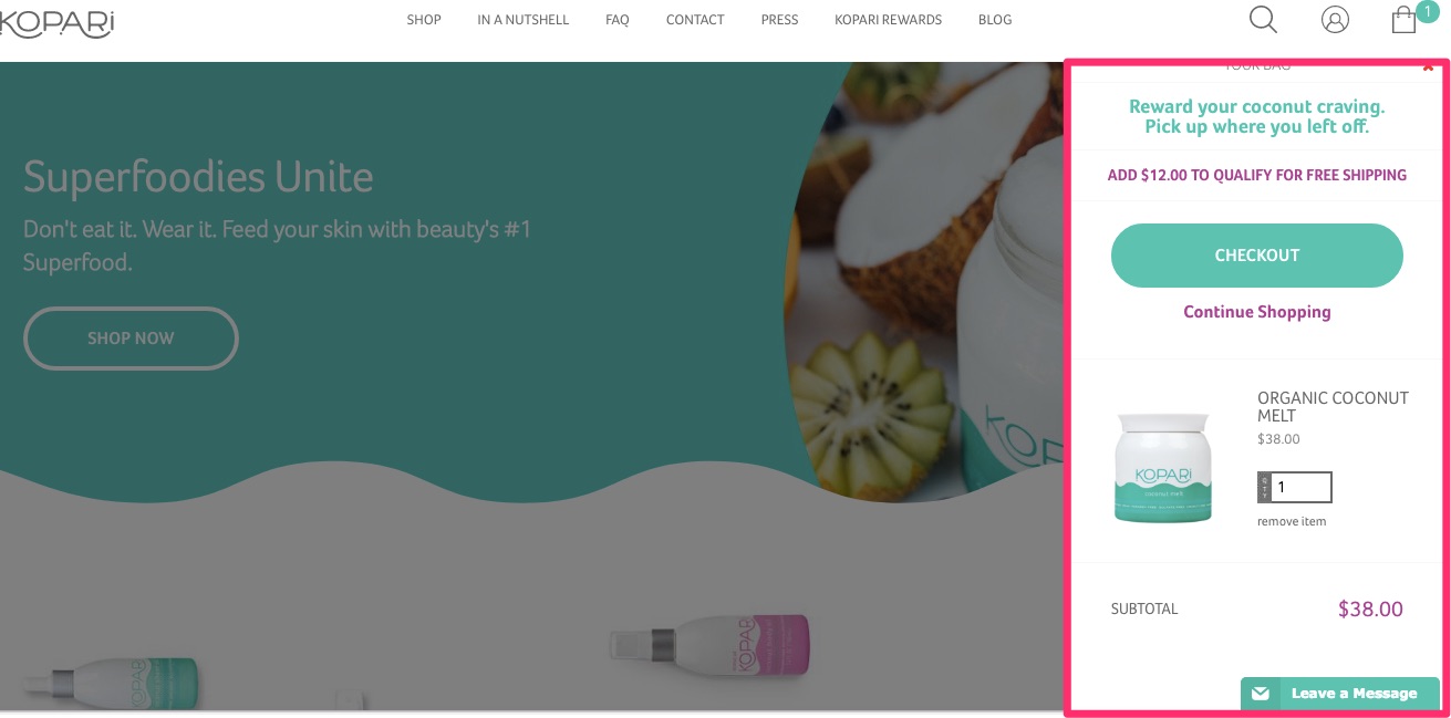 Home page shown to a returning visitor with an item left in her cart. 